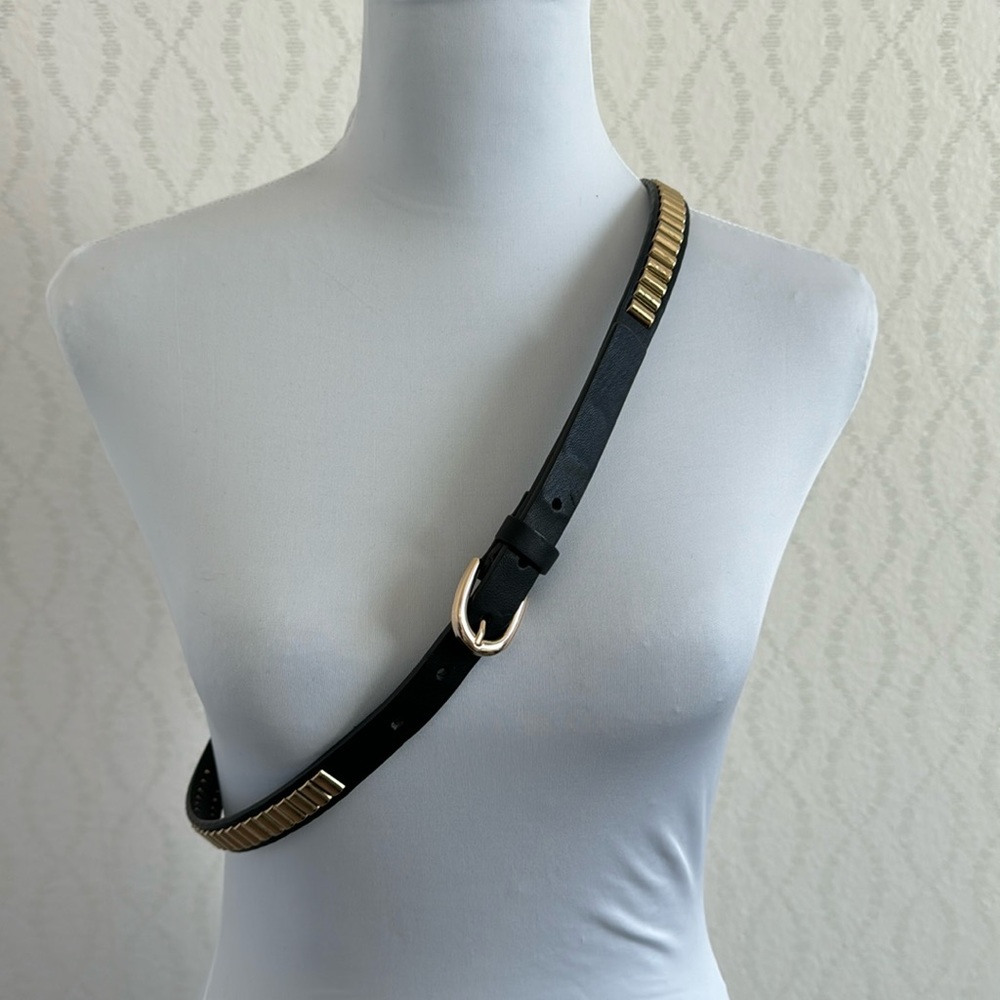 Faux leather belt with gold embellishments